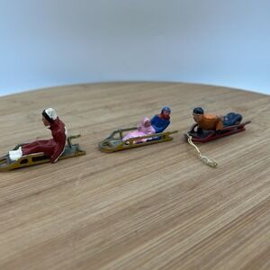 Vtg  Barclay Winter Christmas Figures: 3 sledders on‎ sleds